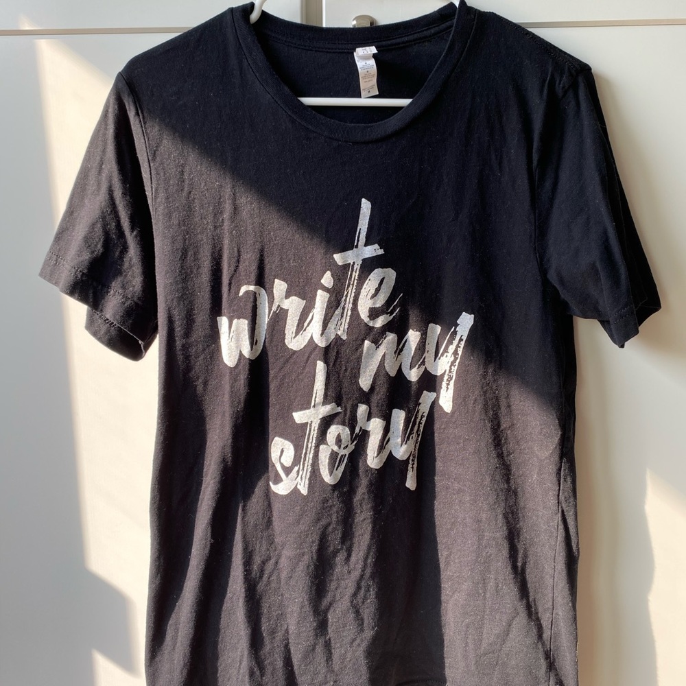 Black “Write my story” graphic tee